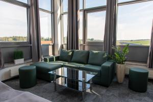 Posezení v ubytování AUSZEIT DAS HOTEL Schweitenkirchen