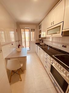 Kuchyňa alebo kuchynka v ubytovaní APARTAMENTO LA PICOTA