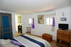 Posteľ alebo postele v izbe v ubytovaní Positano casa bella