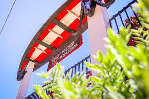 a sign for a ride at a roller coaster at Pousada Marajoara- Hotel Fazenda-Turismo de Aventura in Soure