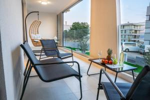 Posedenie v ubytovaní Golden Luxury Apartment