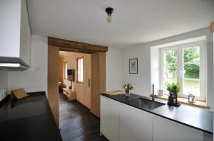 Kuchyň nebo kuchyňský kout v ubytování Ferienhaus Baustert