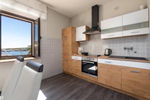 Kuchyň nebo kuchyňský kout v ubytování Apartments Prince