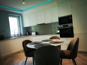 Kuchyň nebo kuchyňský kout v ubytování Fűzliget Mangó Terrace
