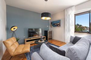 TV a/nebo společenská místnost v ubytování Apartments Prince