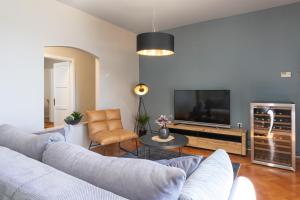 TV a/nebo společenská místnost v ubytování Apartments Prince