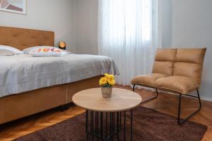 Postel nebo postele na pokoji v ubytování Apartments Prince