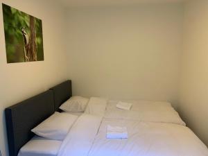 Postel nebo postele na pokoji v ubytování Bonte Specht: tot rust komen in de natuur!