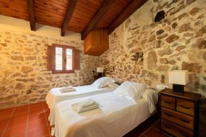 Postel nebo postele na pokoji v ubytování El Cau dels Somnis
