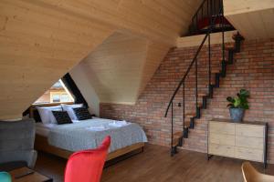 Posteľ alebo postele v izbe v ubytovaní Osada Witów - apartament „Czerwone Wierchy”