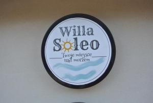 プツクにあるWilla Soleoの塀の看板