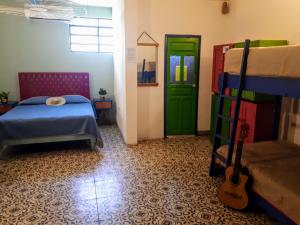 Voodi või voodid majutusasutuse Hostel Candelaria toas