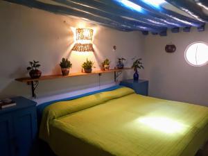 Voodi või voodid majutusasutuse Hostel Candelaria toas