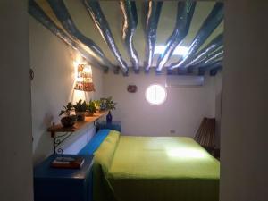 Voodi või voodid majutusasutuse Hostel Candelaria toas