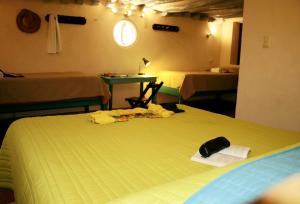 Voodi või voodid majutusasutuse Hostel Candelaria toas