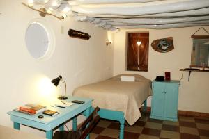 Voodi või voodid majutusasutuse Hostel Candelaria toas