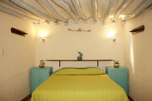 Voodi või voodid majutusasutuse Hostel Candelaria toas
