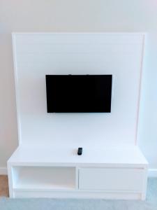 TV a/nebo společenská místnost v ubytování UTM Hotel & Residence