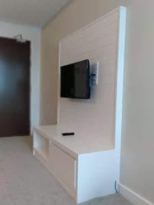 TV a/nebo společenská místnost v ubytování UTM Hotel & Residence