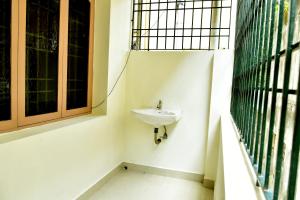 Koupelna v ubytování Sree Devi Niwas