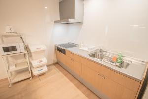 A cozinha ou kitchenette de Ecru Haruyoshi Logement
