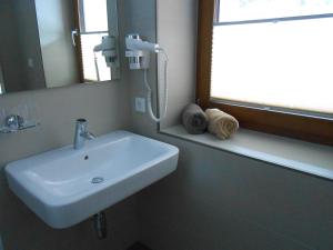 Kúpeľňa v ubytovaní Appartement beim Brunnen 10