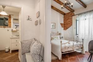 Postel nebo postele na pokoji v ubytování Villa Manda Korina