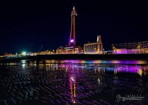 a view of a city at night with lights at Thornhill Blackpool in Blackpool +6 photos