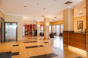 an office with a lobby with a reception desk at Premium Hotel Bacero Wrocław in Wrocław