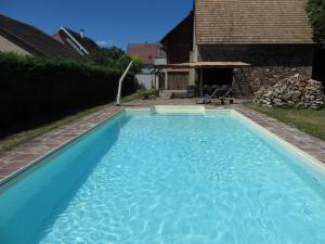 Bazén v ubytování Le 128, duplex alsacien 10 personnes, piscine nebo v jeho okolí