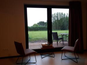 Posezení v ubytování B&B In de Wei