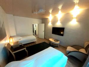 Katil atau katil-katil dalam bilik di Modernes Apartment Metzingen 2