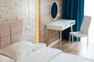 Posteľ alebo postele v izbe v ubytovaní LEOGRAND Three Bedrooms VIP Apartments on Kniazia Romana 12
