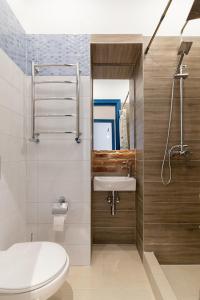 Kúpeľňa v ubytovaní LEOGRAND Three Bedrooms VIP Apartments on Kniazia Romana 12