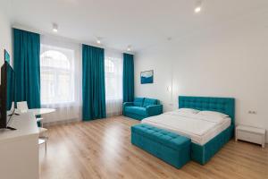 Posteľ alebo postele v izbe v ubytovaní LEOGRAND Three Bedrooms VIP Apartments on Kniazia Romana 12