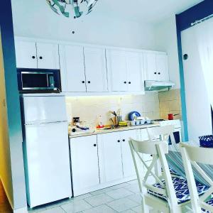 Kuchyňa alebo kuchynka v ubytovaní Lucas Lux Flogita apartment