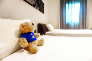 Кровать или кровати в номере S33 Compact Sukhumvit Hotel