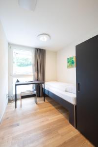 Postel nebo postele na pokoji v ubytování B&B Hotel Mattli Übernachtung Frühstück