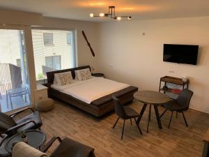 Postel nebo postele na pokoji v ubytování Apartmán C16 Mikulov