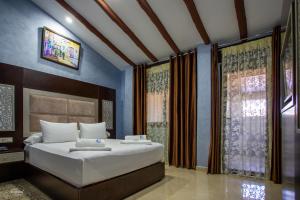 Ένα ή περισσότερα κρεβάτια σε δωμάτιο στο Hotel Jibal Chaouen