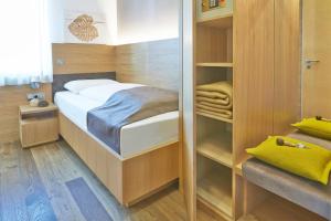 Posteľ alebo postele v izbe v ubytovaní Hotel Post Gries