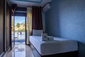 Voodi või voodid majutusasutuse Hotel Jibal Chaouen toas +37 fotot