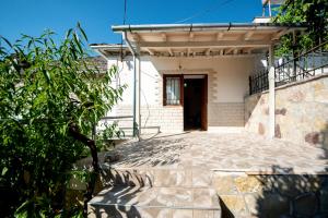 Fotografie z fotogalerie ubytování Guest House Garden v destinaci Gjirokastër