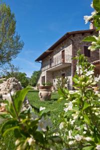 Vonkajšia záhrada v ubytovaní Relais Parco Del Subasio