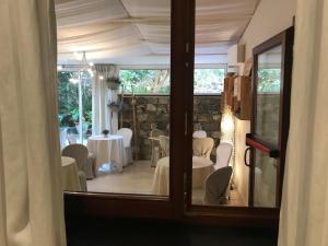 a view of a dining room with tables and chairs at Locanda A Cà Du Gigante in Monterosso al Mare