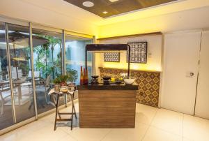 A cozinha ou cozinha compacta de Holiday Inn Belo Horizonte Savassi by IHG