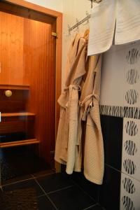 a towel hanging on a rack in a bathroom at Holiday Village Katrin in Nova Kakhovka