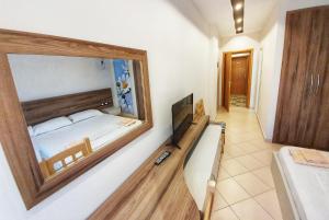TV a/nebo společenská místnost v ubytování Hotel Kamomil
