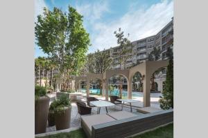 an artist rendering of the courtyard at the apartment complex at Hua Hin La Casita modern room in city centre in Hua Hin
