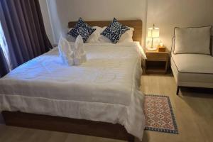 Postel nebo postele na pokoji v ubytování Hua Hin La Casita modern room in city centre + 19 fotografií